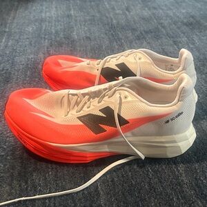 New Balance White and Red Athletic Shoes